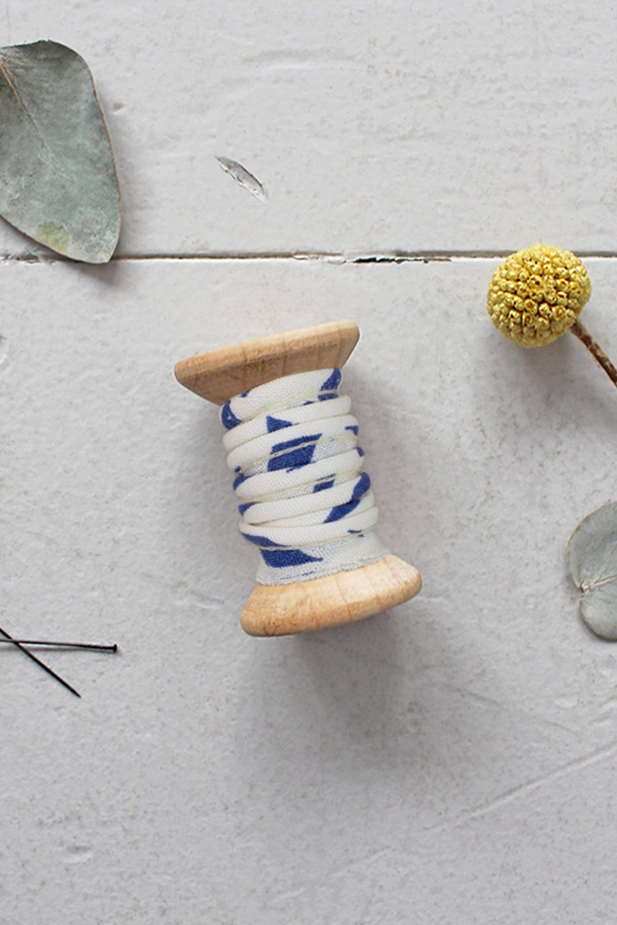Atelier Brunette cobalt and white piping on a wooden spool, cord trim for sewing