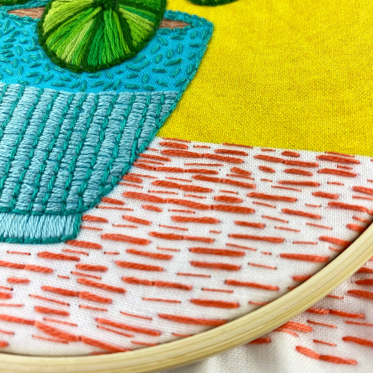 Keller Design Co. Pilea plant embroidery kit, close-up of the stitched leaves