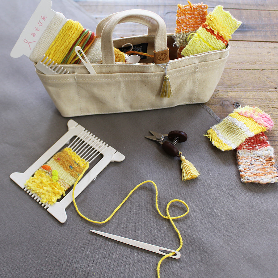 Cohana Pokeori mini loom weaving kit, with tools on a yellow background