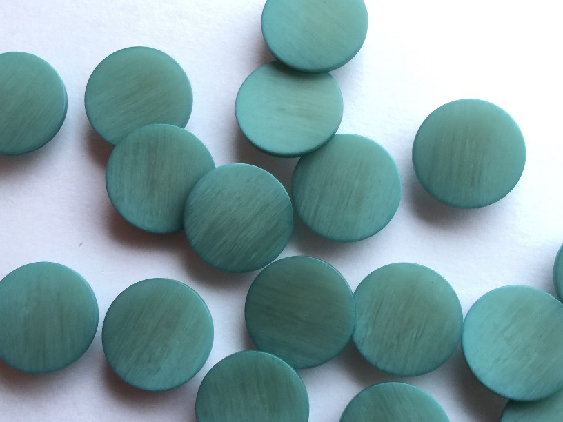 Flat-Top Teal Buttons
