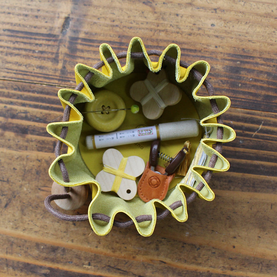 Cohana Shigaraki ware button magnet, holding sewing pins on fabric