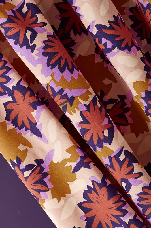 Atelier Brunette Waterlily Maple ECOVERO viscose close-up of the floral apparel fabric