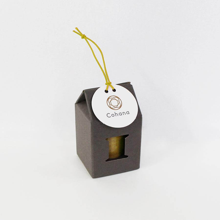 Cohana Hasami magnetic pin holder, with a green tassel cord