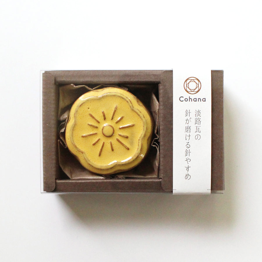 Cohana Awaji Kawara magnetic needle rest with needle polisher, in yellow, top view