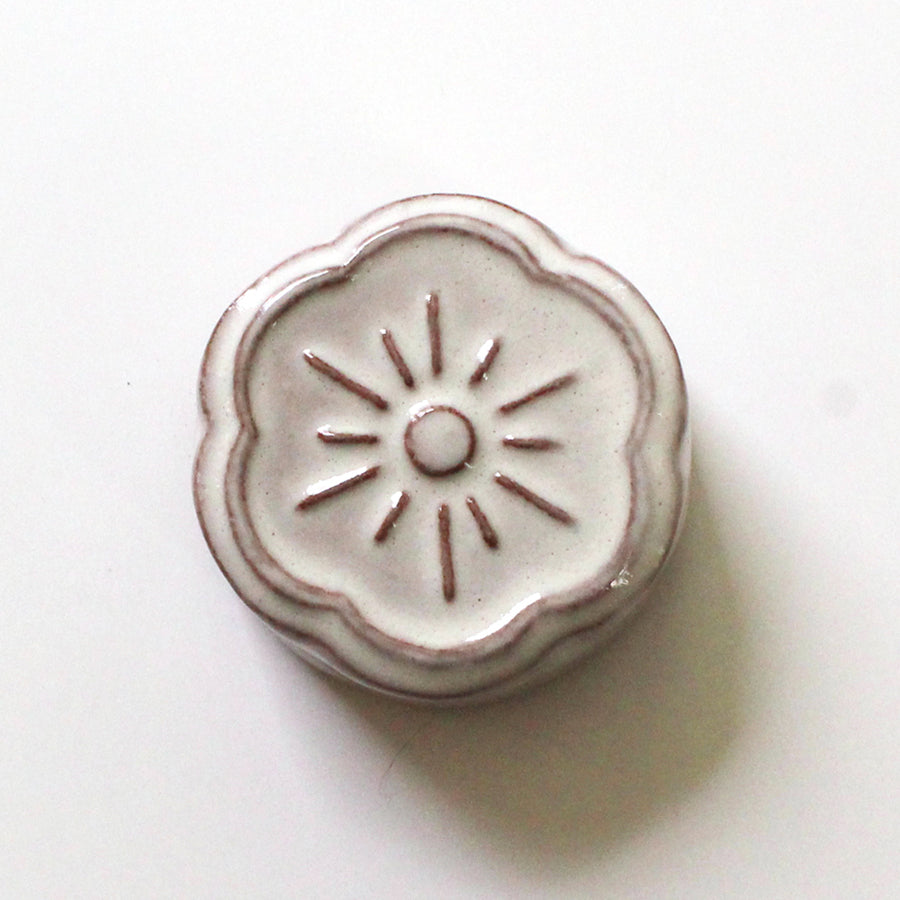 Cohana Awaji Kawara magnetic needle rest with needle polisher, in cream