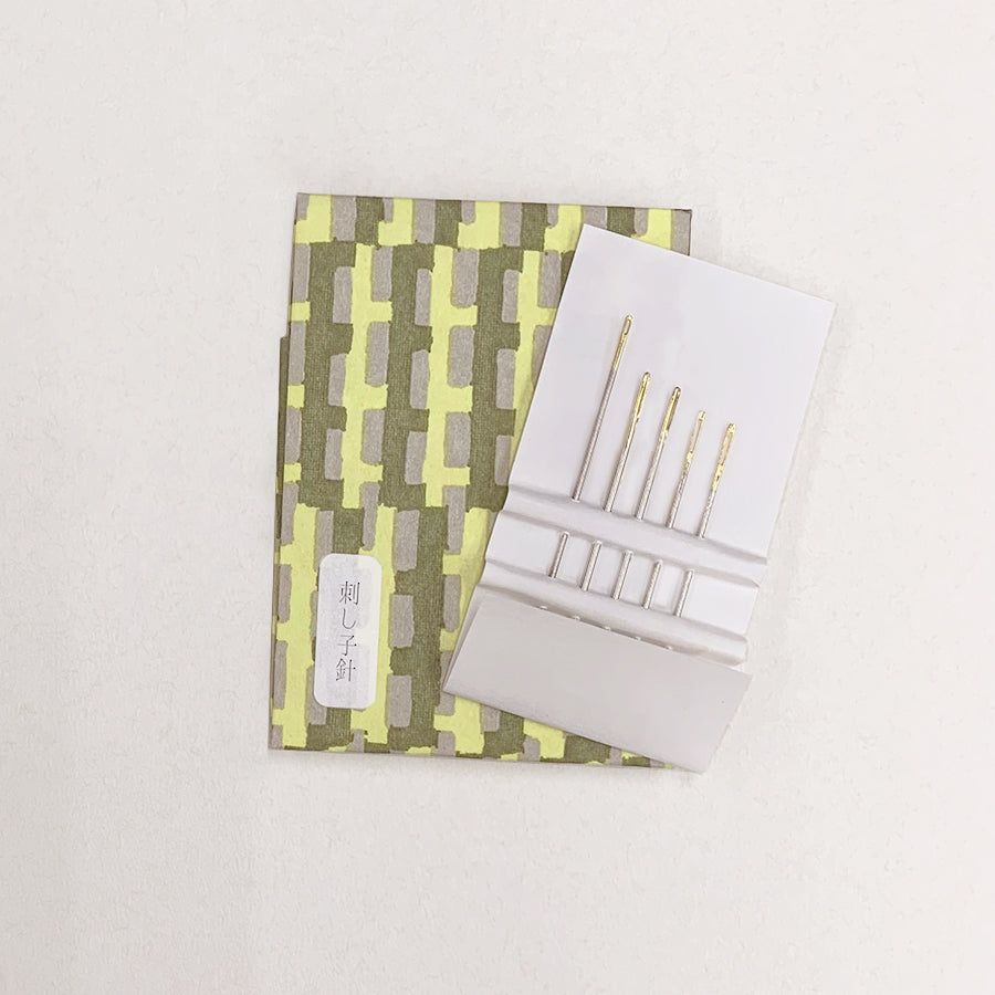 Cohana assorted needles in a Haibara chiyogami paper pack, in yellow pattern