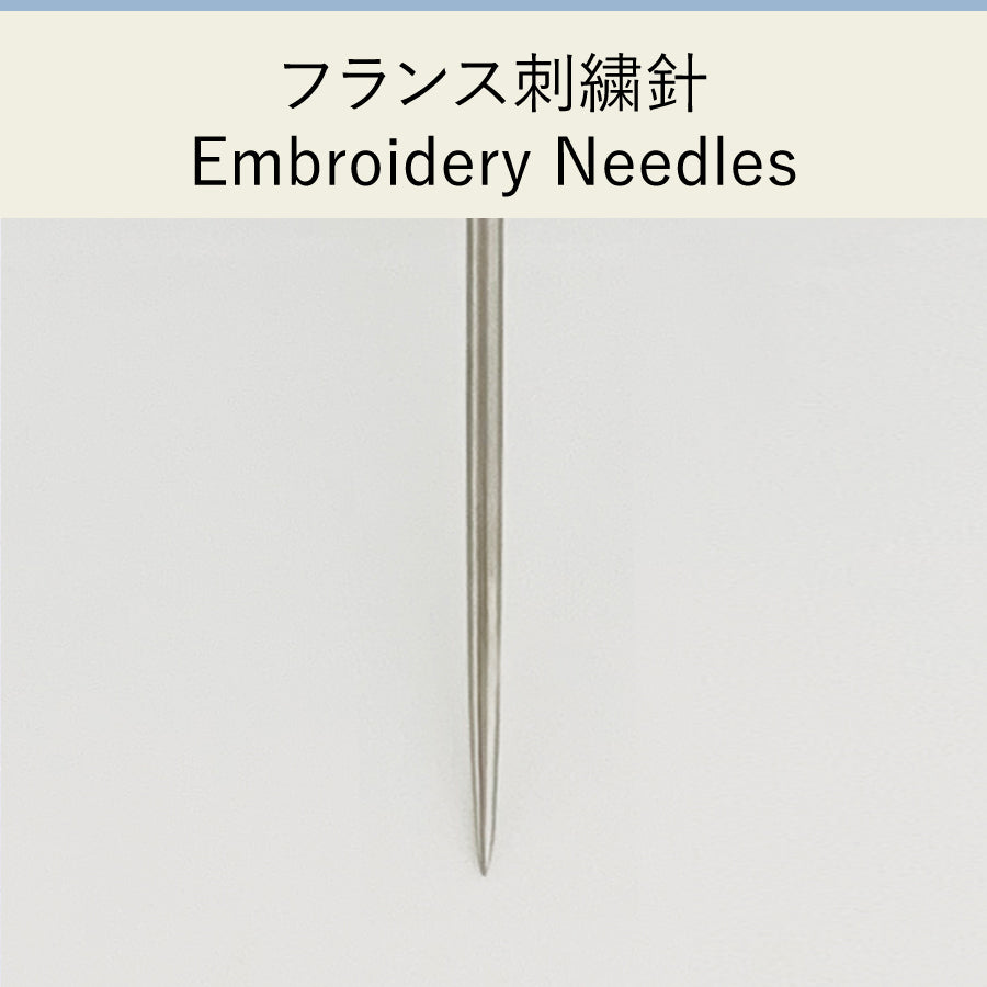 Cohana assorted needles in a Haibara chiyogami paper pack, close-up of an embroidery needle