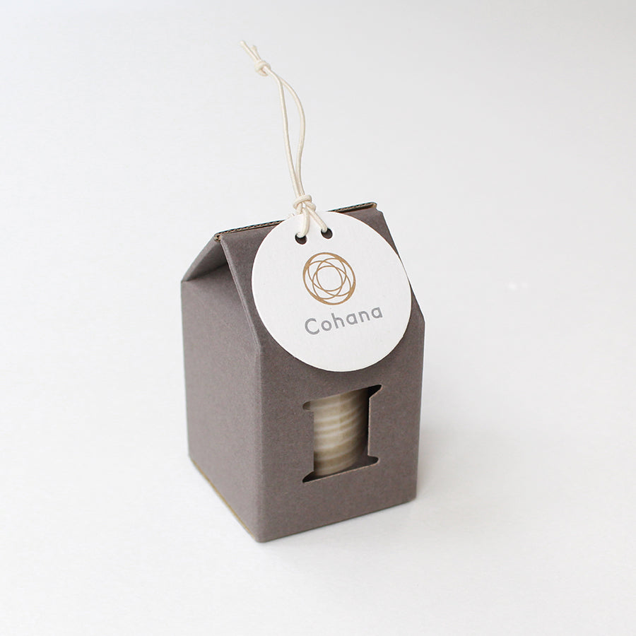 Cohana Hasami magnetic pin holder, with a cord on its stand