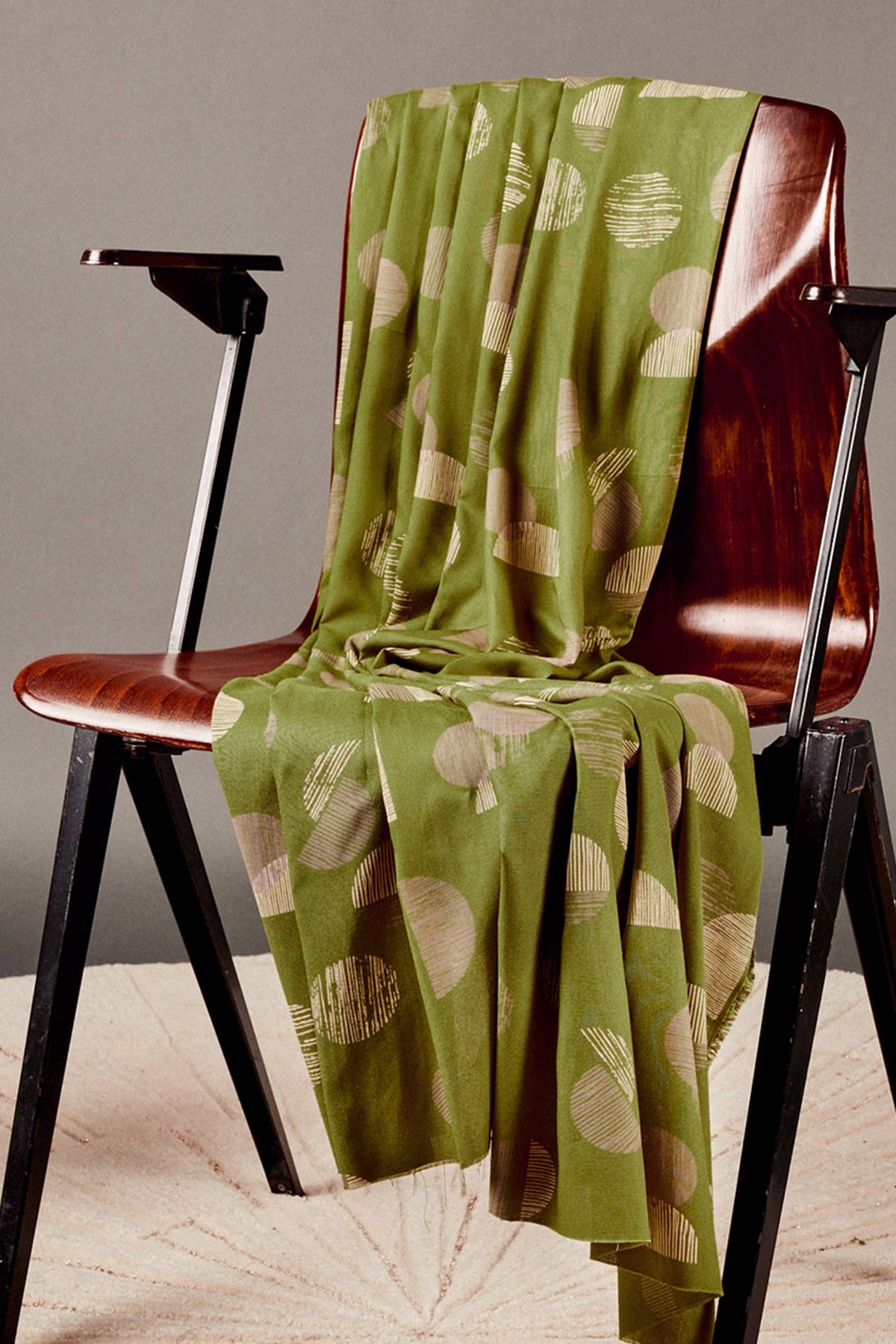 Atelier Brunette Jane Matcha Leaf viscose draped over a chair
