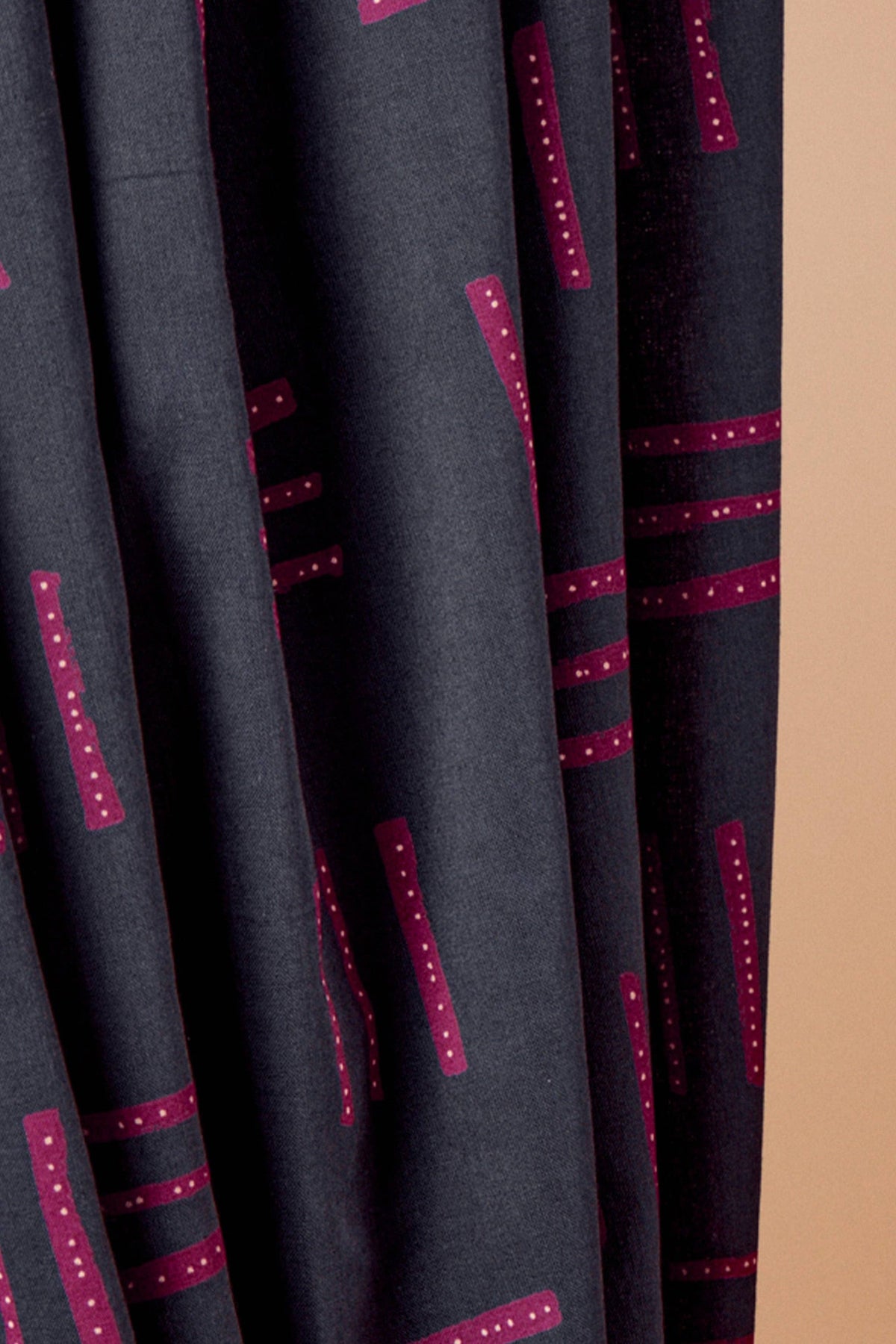 Atelier Brunette Raspberry Geo double gauze draped to show the soft texture