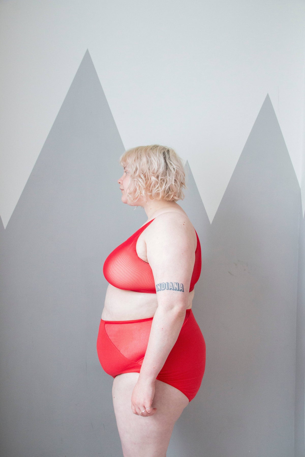 Side view of red knickers sewn from the Sophie Hines Median Knickers sewing pattern