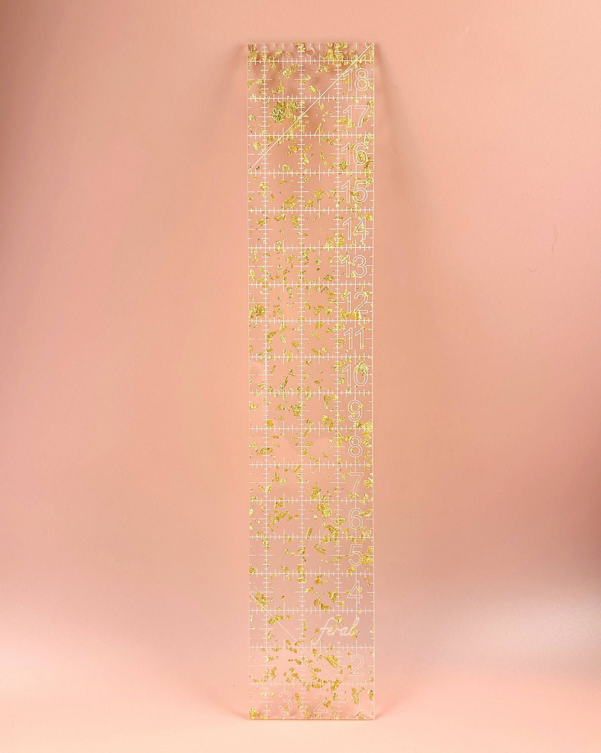 Feral Notions fat quarter quilting ruler in gold glitter acrylic, full length view of the clear sewing ruler