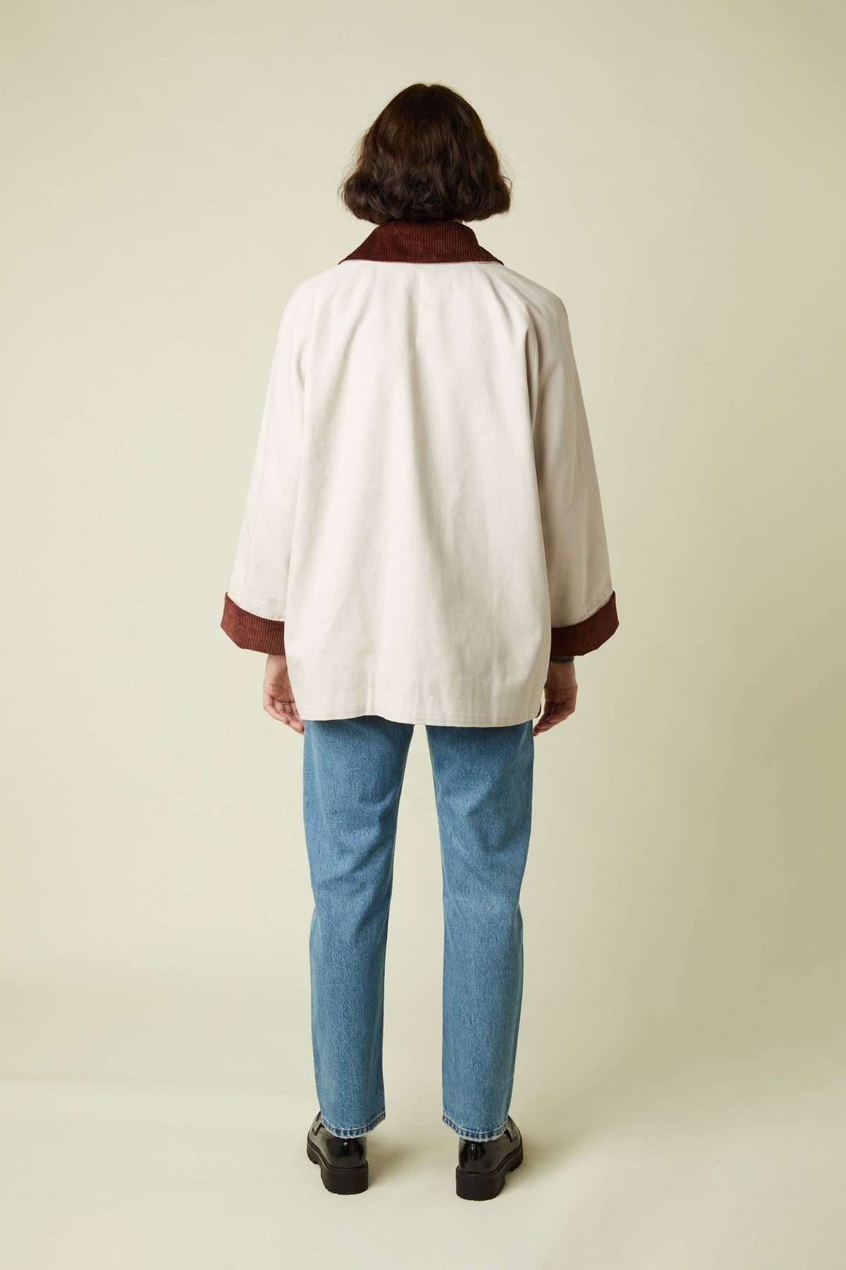 Back view of a cream barn jacket sewn from the Atelier Brunette LA Barn Jacket printed sewing pattern