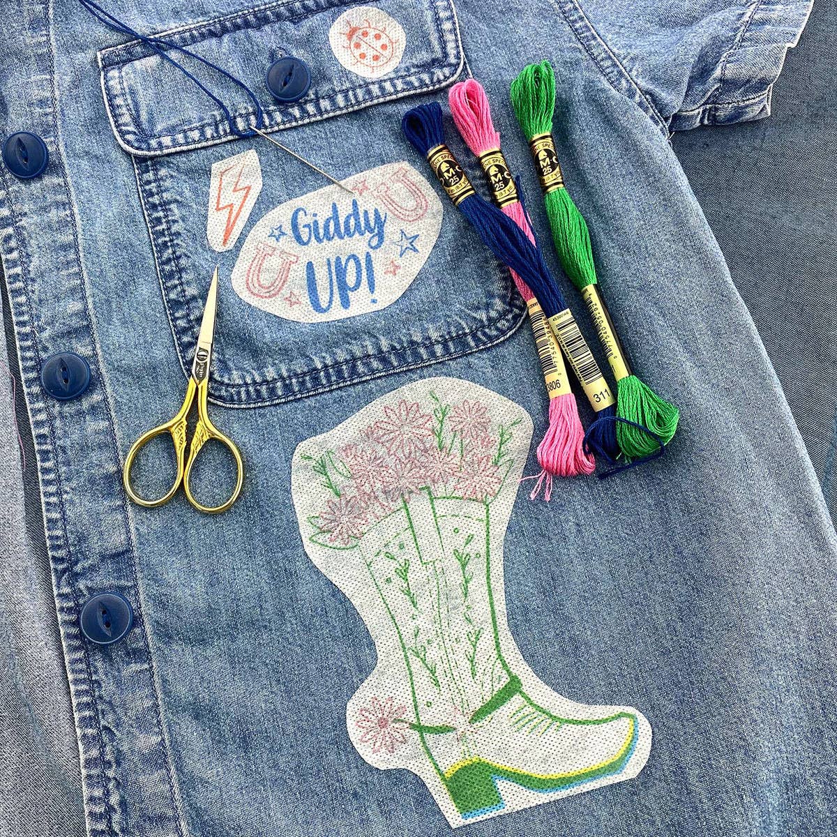 Keller Design Co. Disco Cowgirl stick and stitch embroidery patterns, stitched boot on a denim jacket