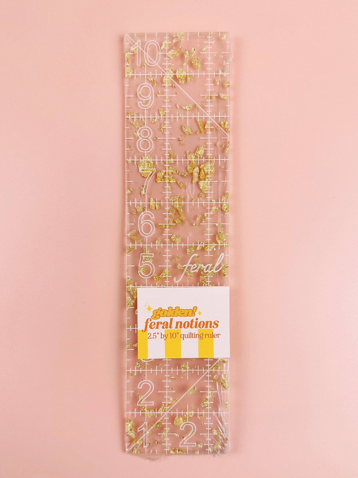Feral Notions 2.5 x 10 inch quilting ruler in confetti acrylic, straight-on view of the grid