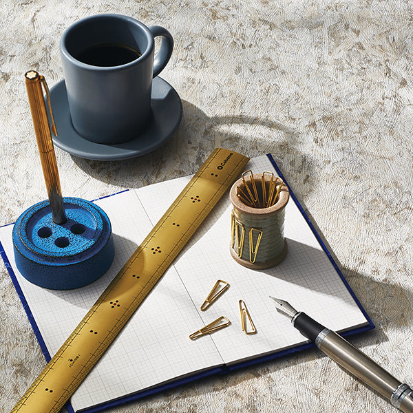 Cohana Hasami magnetic pin holder, with a needle on fabric