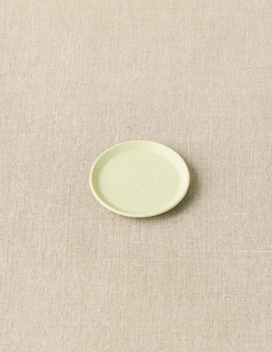CocoKnits notions dish, side angle of the shallow ceramic tray