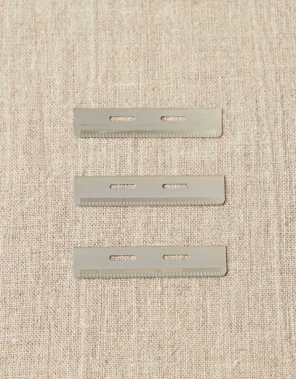 CocoKnits Fuzz Off Comb refill blades laid out