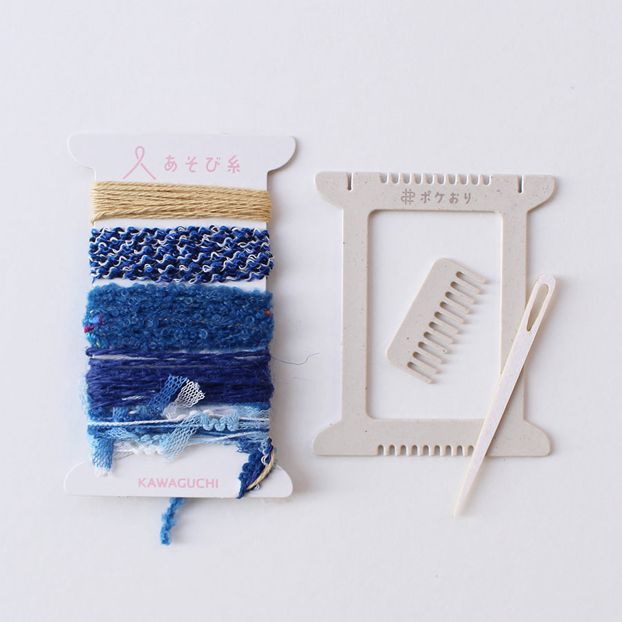 Cohana Pokeori mini loom weaving kit, with blue yarn on the loom