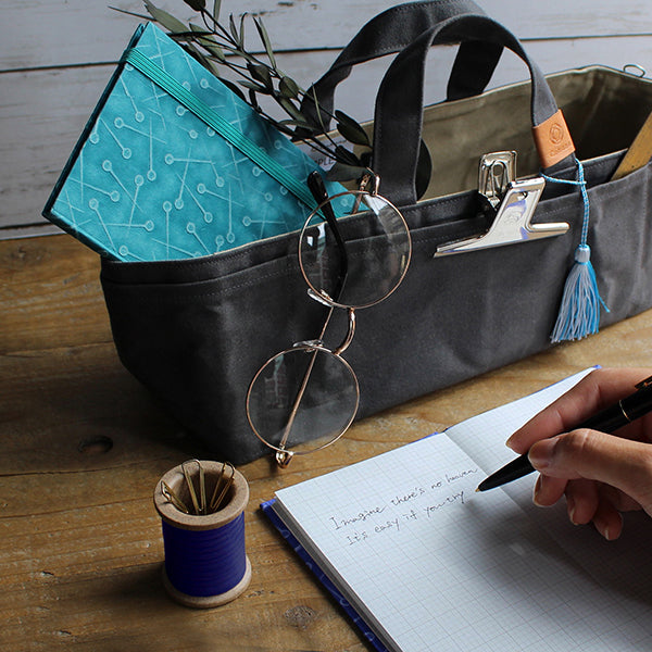 Cohana Hasami magnetic pin holder, in a blue bag with knitting
