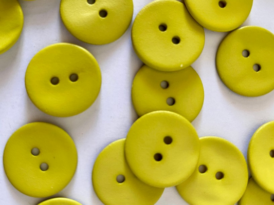 Chartreuse buttons on a white background