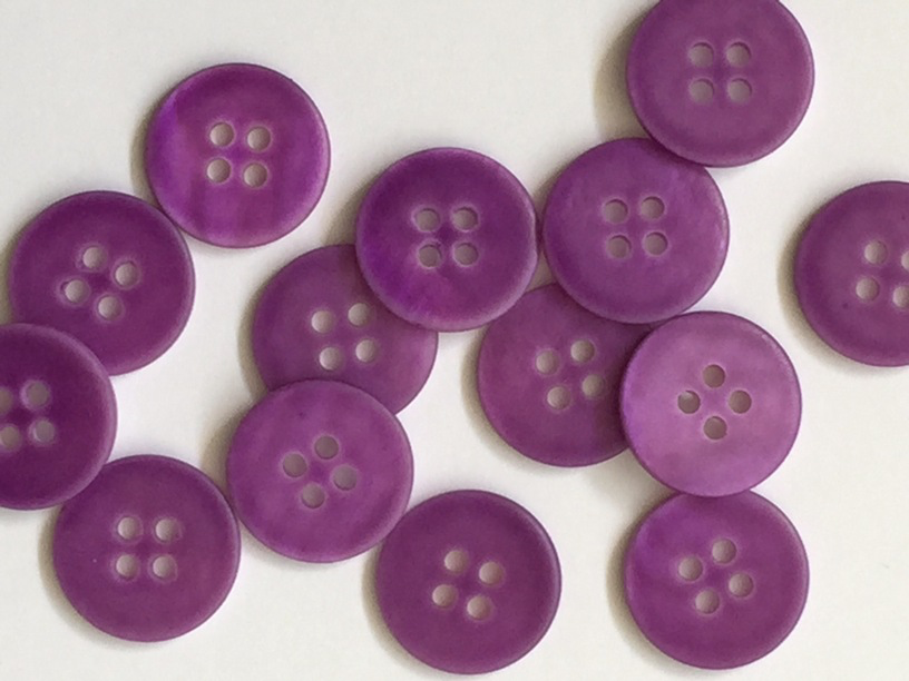 Purple buttons on a white background