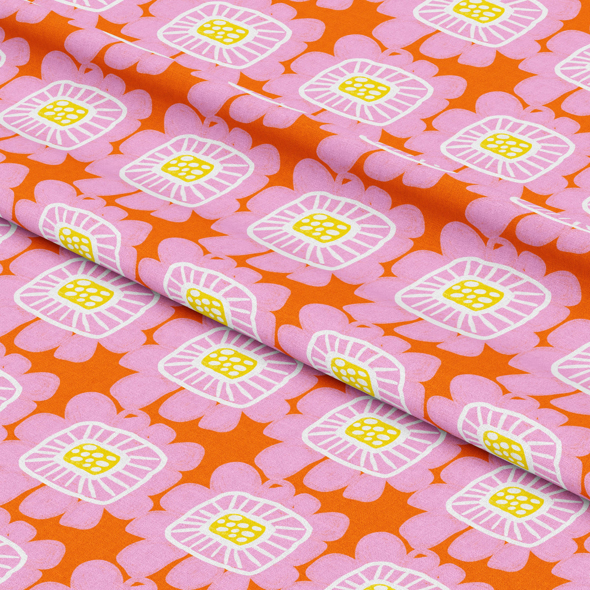 Riku Flower in Apricot fabric folded flat, showing the pink and orange floral