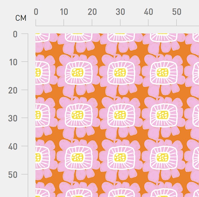 Riku Flower in Apricot classic-scale print shown against a centimeter ruler for scale