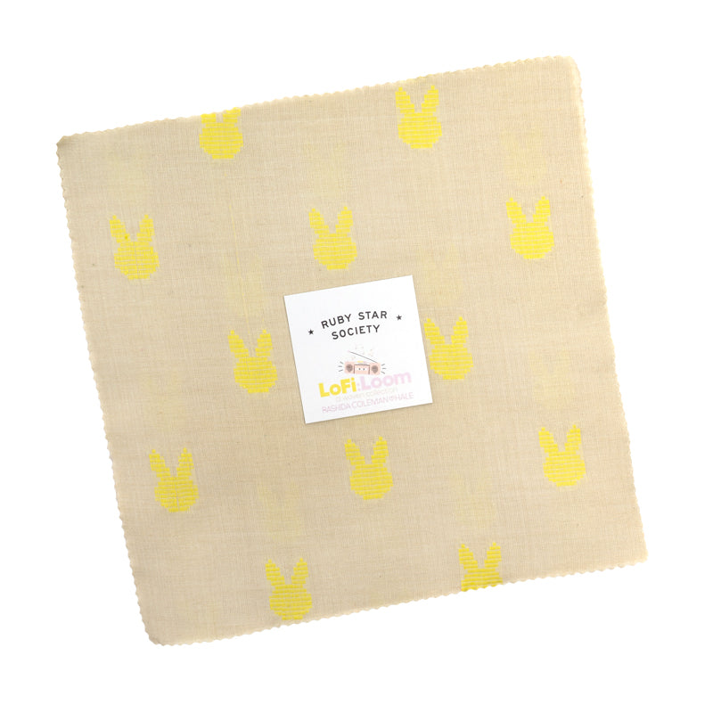 Ruby Star Society Lofi Loom Wovens layer cake, 10 inch yarn-dyed woven cotton squares in a cream and yellow wrapped stack