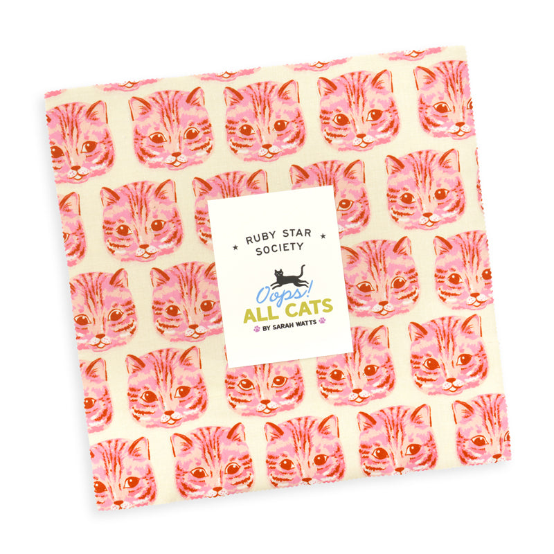Ruby Star Society Oops All Cats layer cake, 10 inch quilting cotton squares with a pink cat face print on top