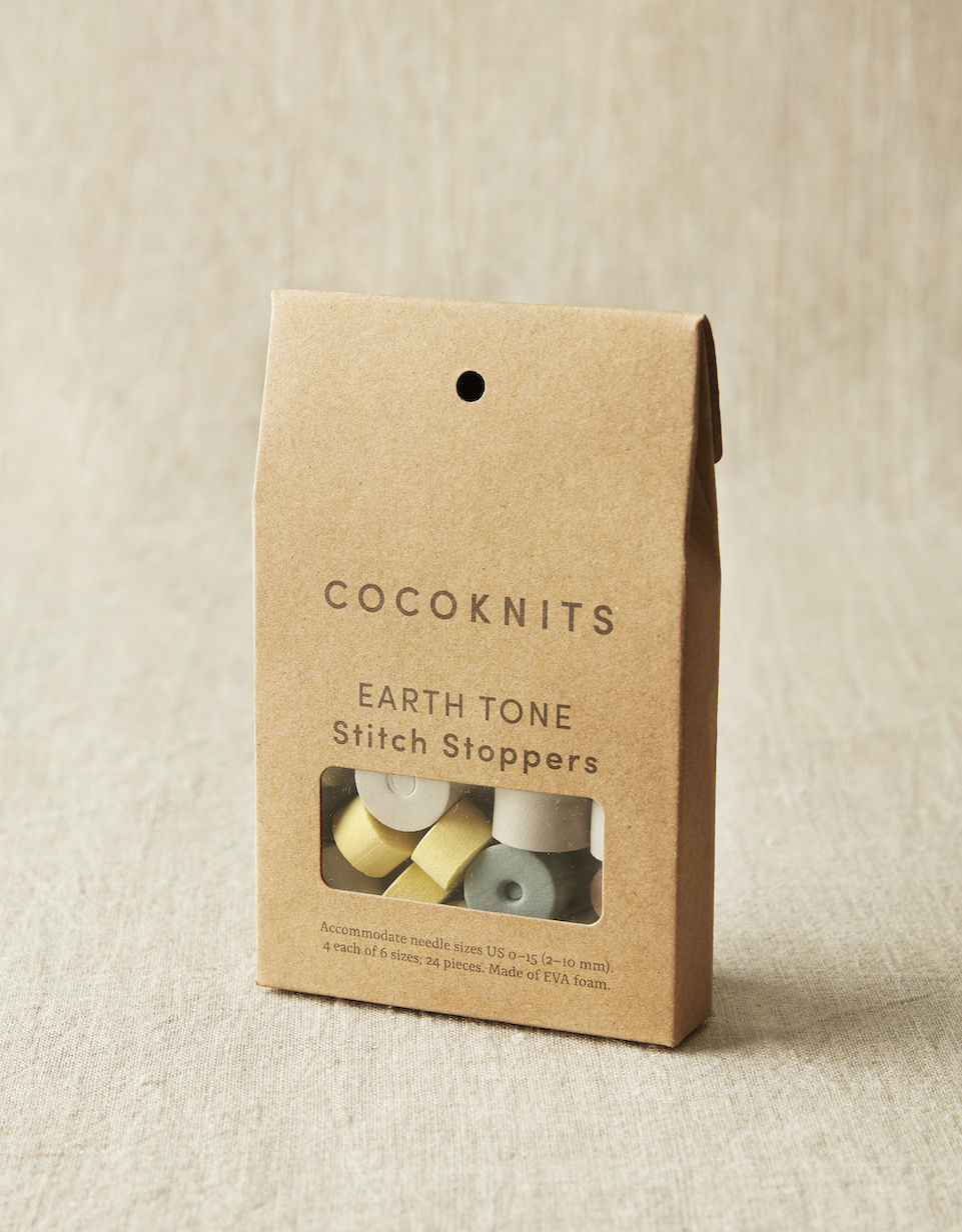CocoKnits stitch stoppers in earth tones in their package