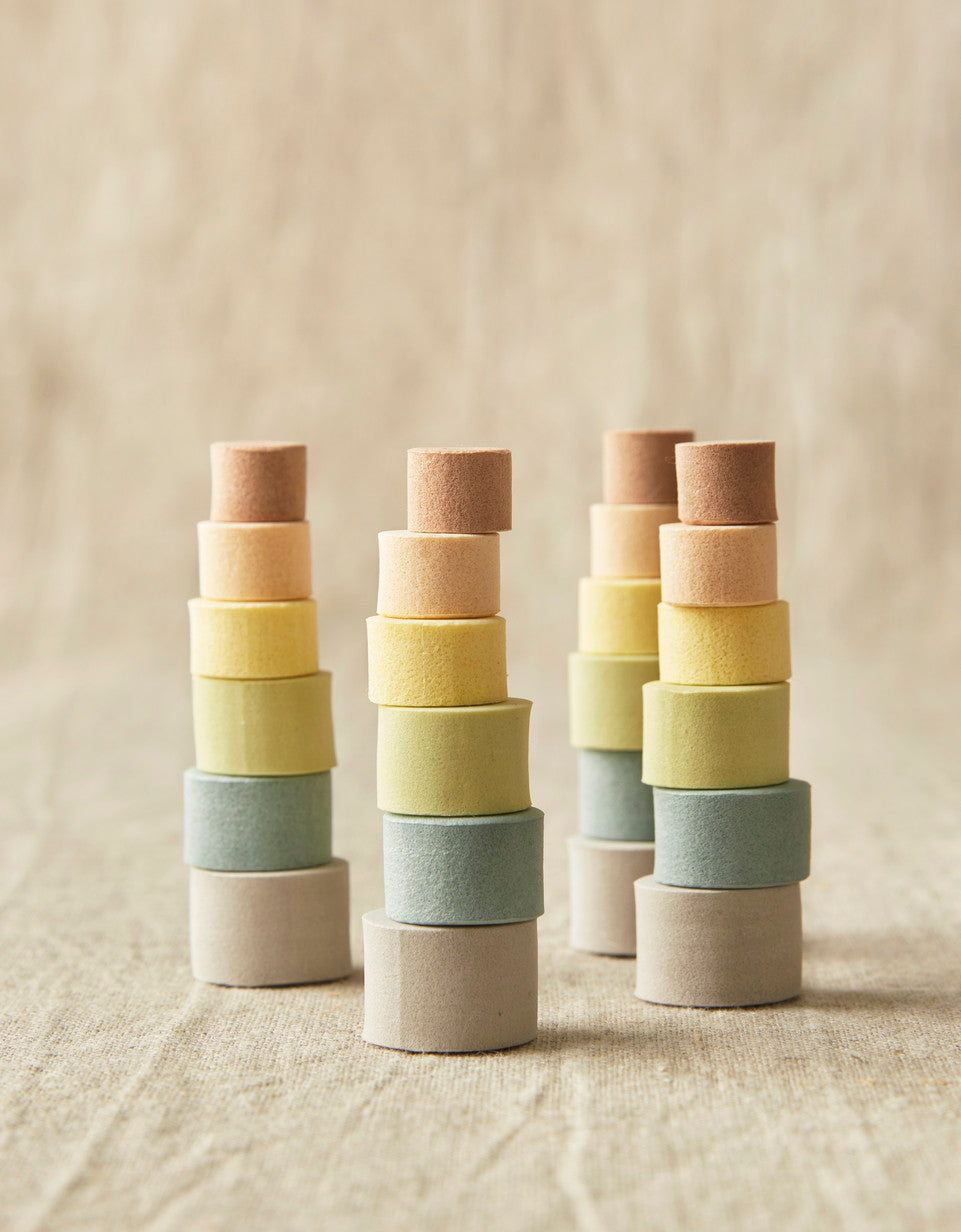 CocoKnits earth tone stitch stoppers stacked by color
