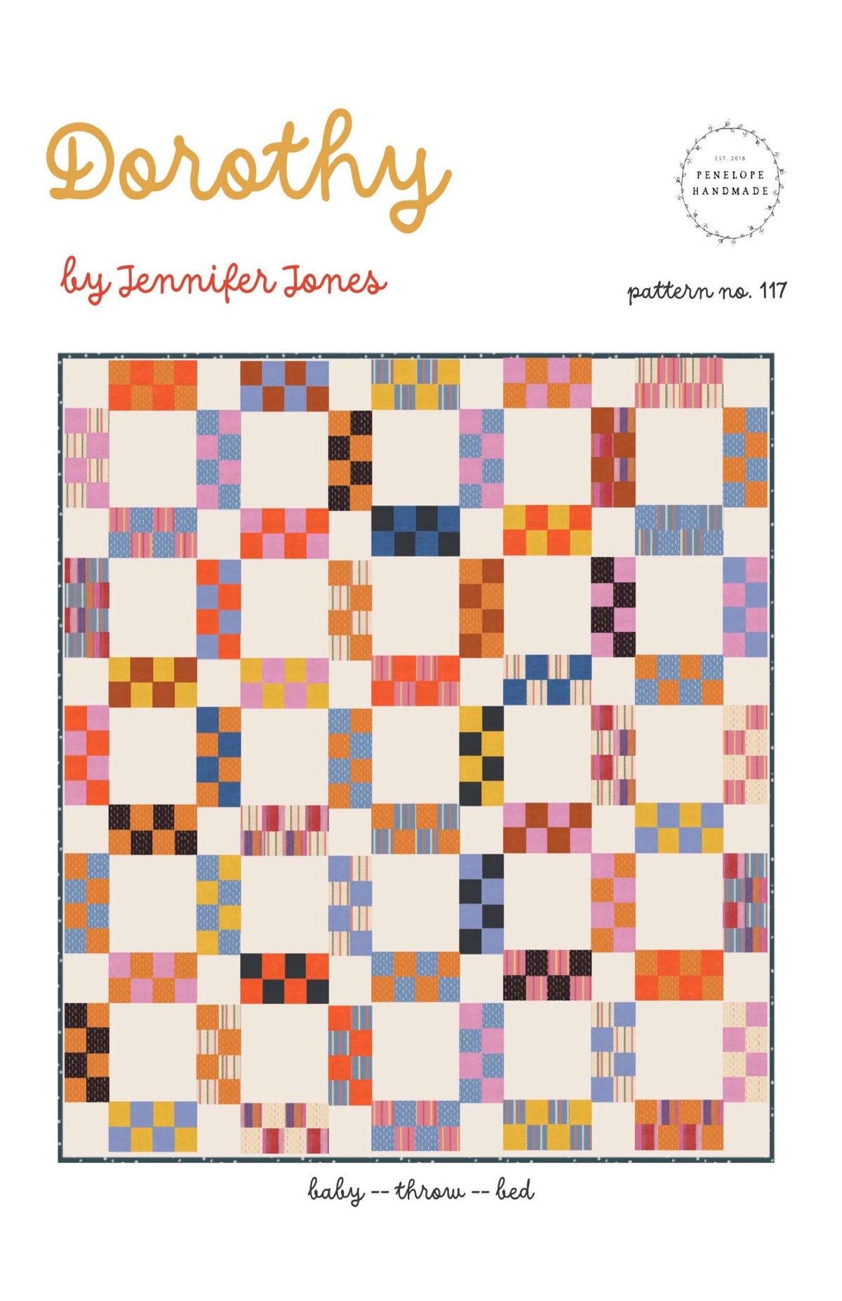 Penelope Handmade Dorothy quilt pattern cover with a scrappy patchwork quilt design