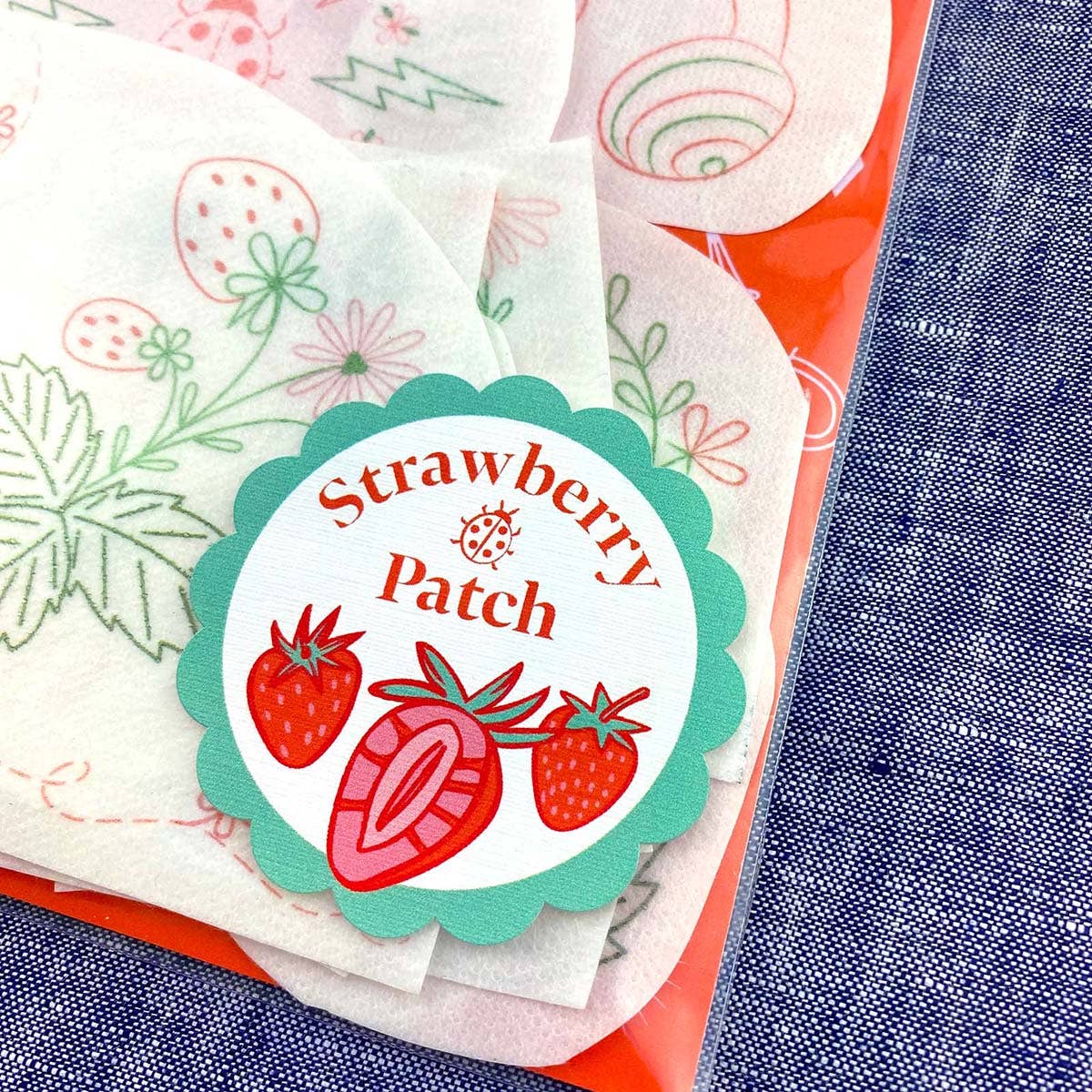 Keller Design Co. Strawberry Patch stick and stitch embroidery patterns, package with strawberries