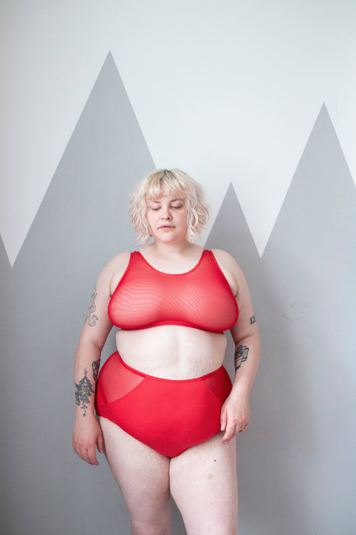 Model in red knickers and bra made with the Sophie Hines Median Knickers sewing pattern, front view