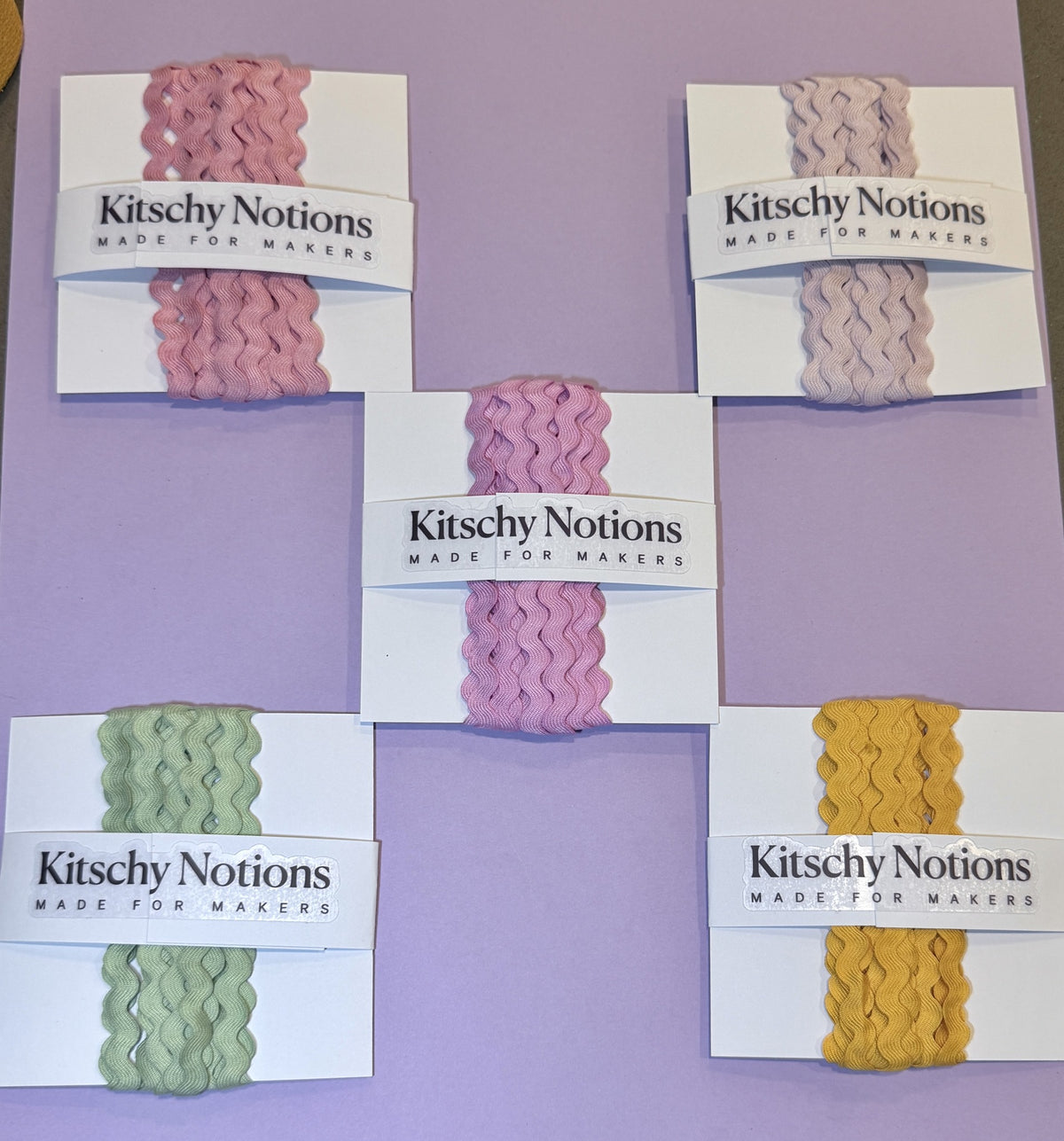 Five hand-dyed Tencel ric-rac colors on Kitschy Notions cards: Moulin Rouge, Stargazer, Pink Pony, Seaglass, and Marigold