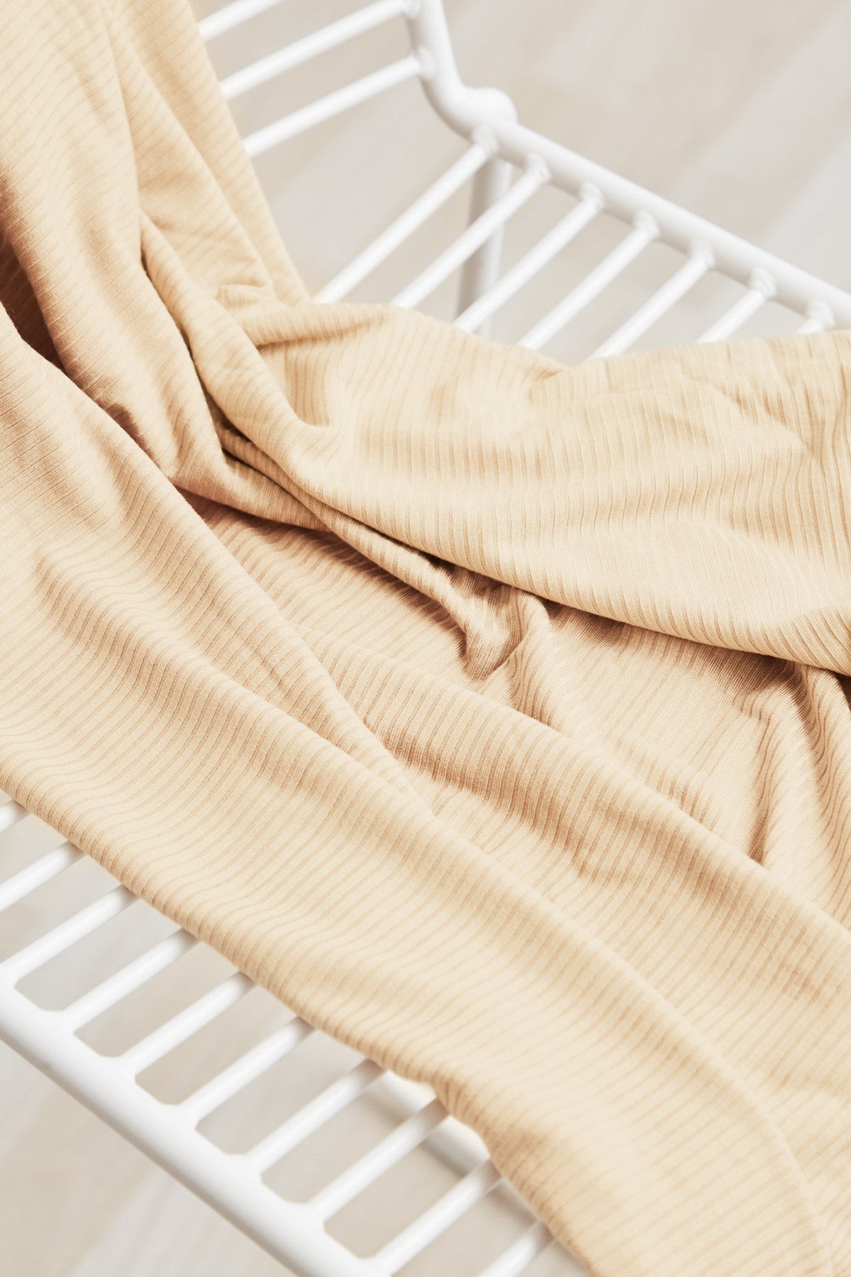 Rhythmic Rib modal jersey in Wheat, a cream ribbed knit fabric by the half yard