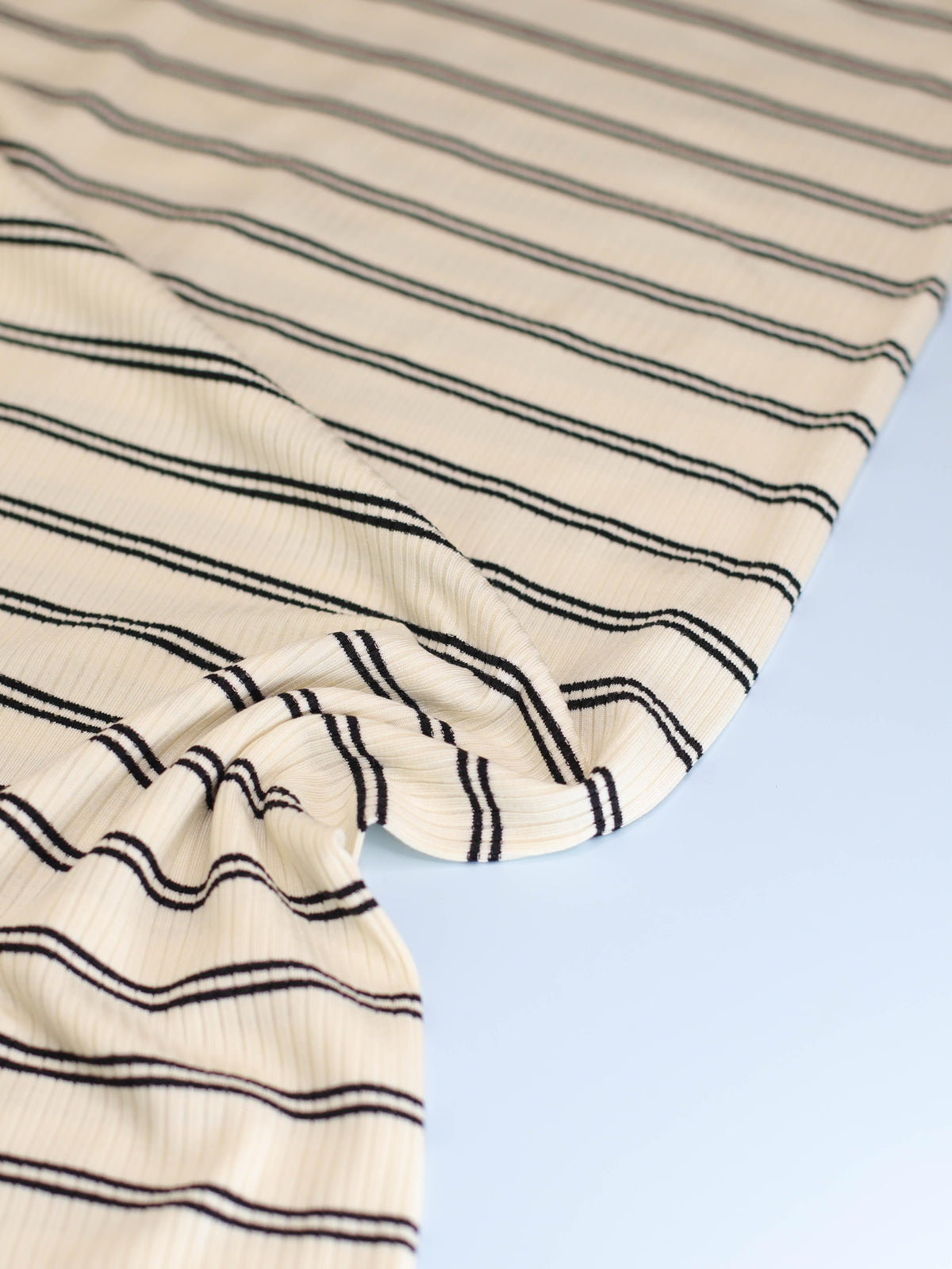 meetMILK Derby Slim Stripe modal jersey in Shell, cream and brown pinstripe knit fabric