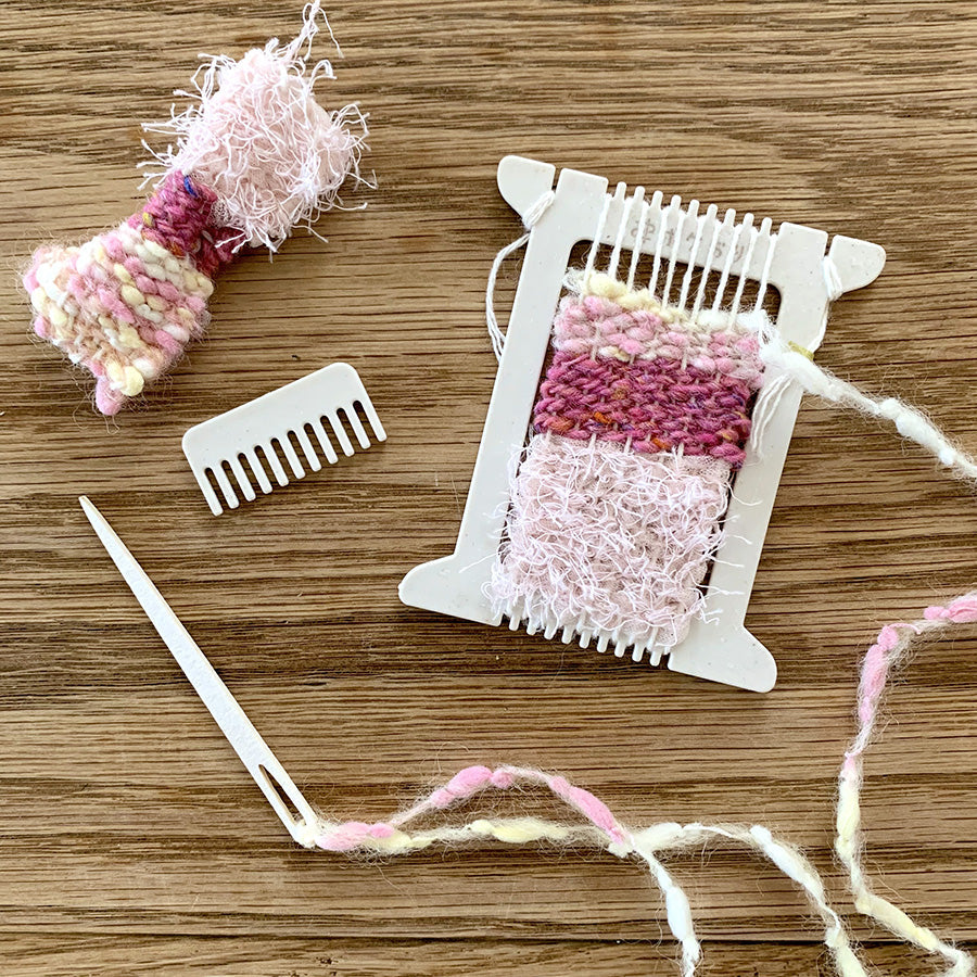 Cohana Pokeori mini loom weaving kit, with weaving on a wood table