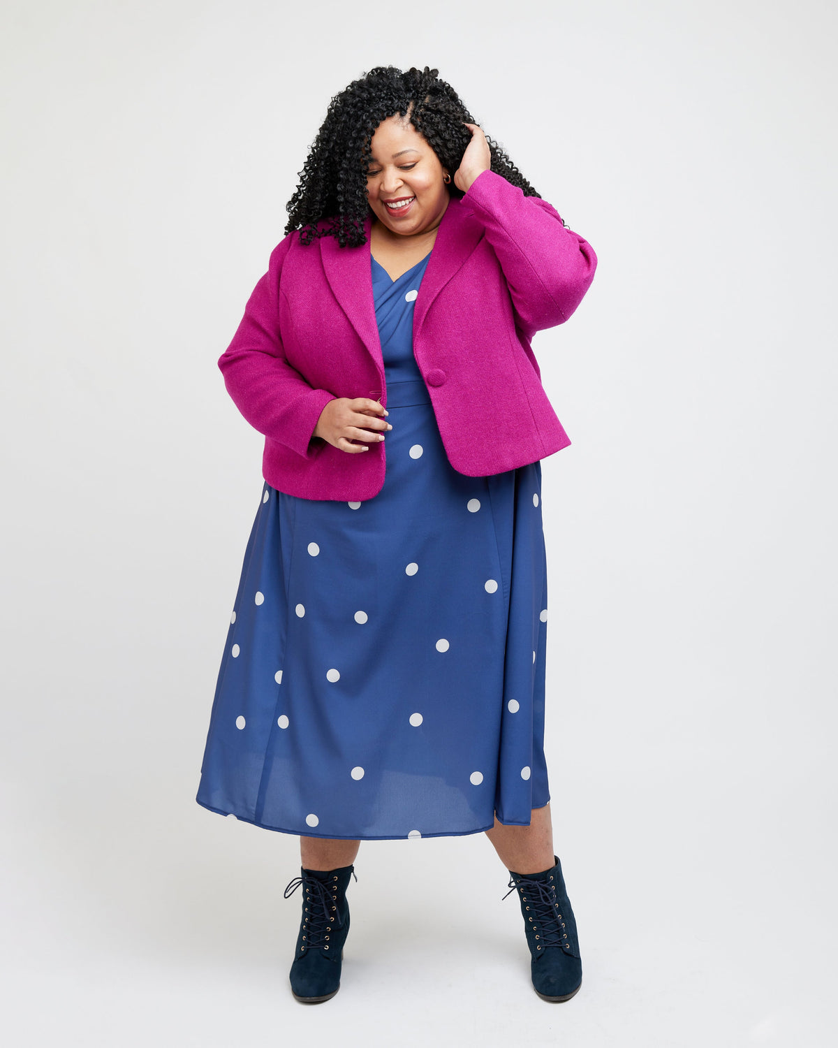 Cashmerette Auburn Blazer PDF sewing pattern, woman wearing a bright pink coat over a blue dress with white polka dots