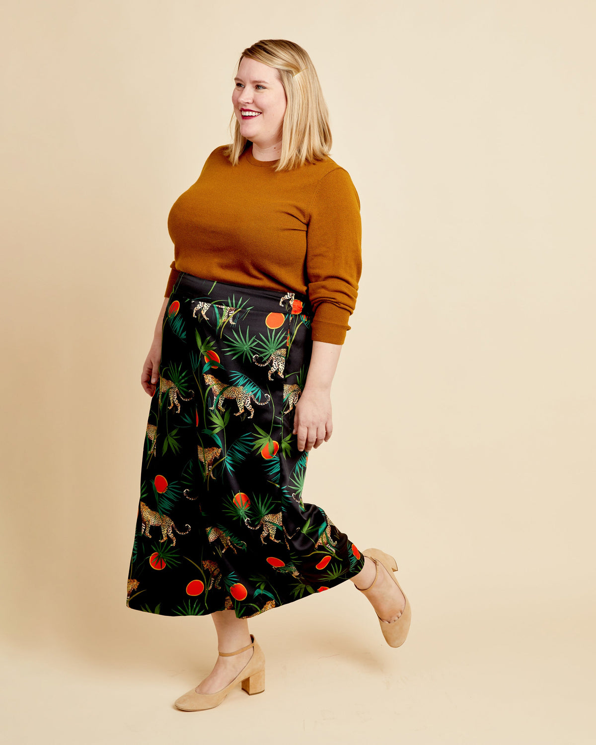 Cashmerette Calder Pants and Shorts PDF sewing pattern, woman wearing a mustard sweater and patterned skirt