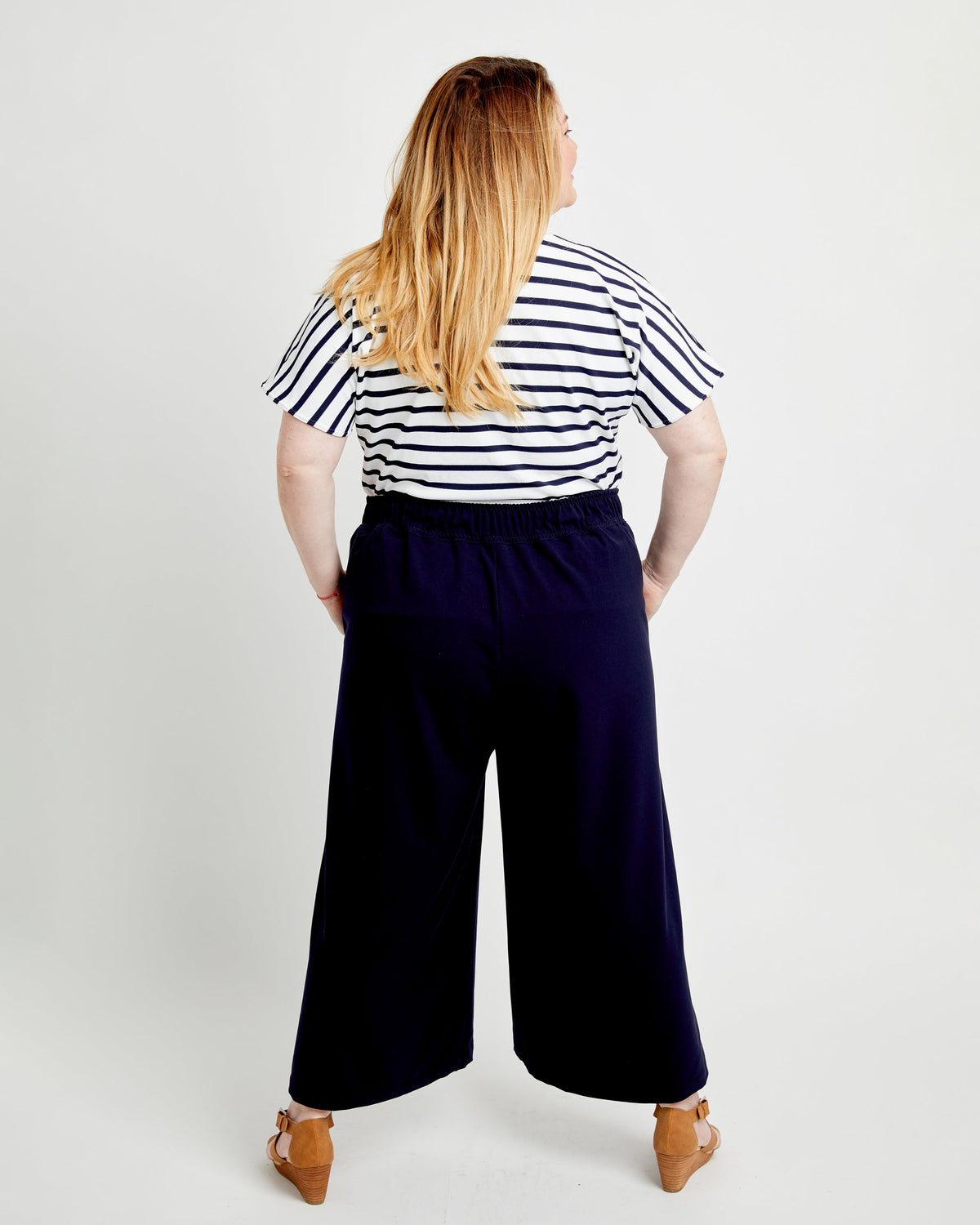 Cashmerette Calder Pants and Shorts PDF sewing pattern, person wearing a striped shirt and wide-leg pants