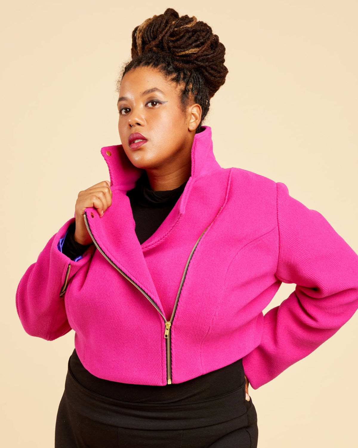 Cashmerette Canton Moto Jacket PDF sewing pattern, person wearing a bright pink jacket and black pants, close-up of the collar