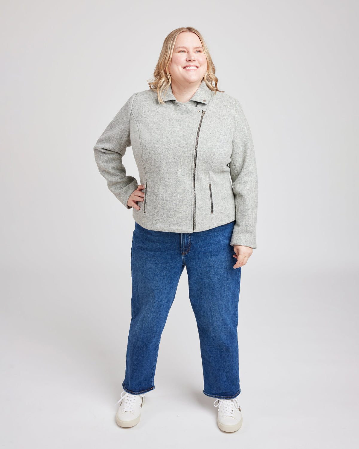 Cashmerette Canton Moto Jacket PDF sewing pattern, person wearing a gray jacket and blue jeans, front view