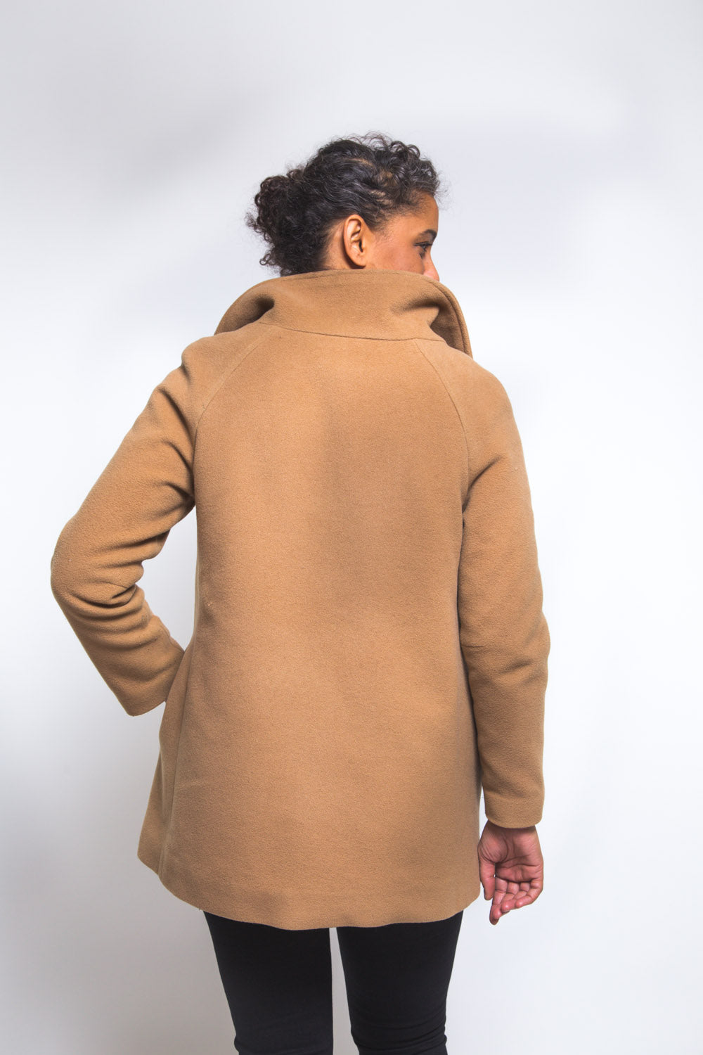 Back view of a camel coat sewn from the Closet Core Clare Coat sewing pattern