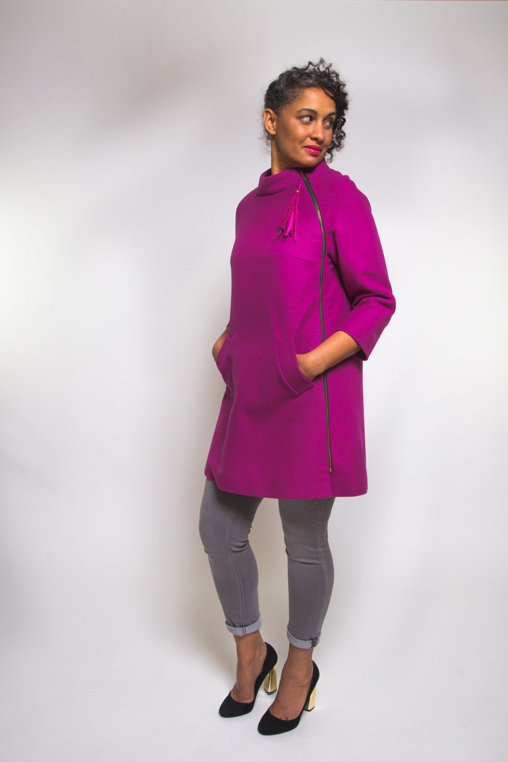 Model in a magenta wool coat made with the Closet Core Clare Coat sewing pattern