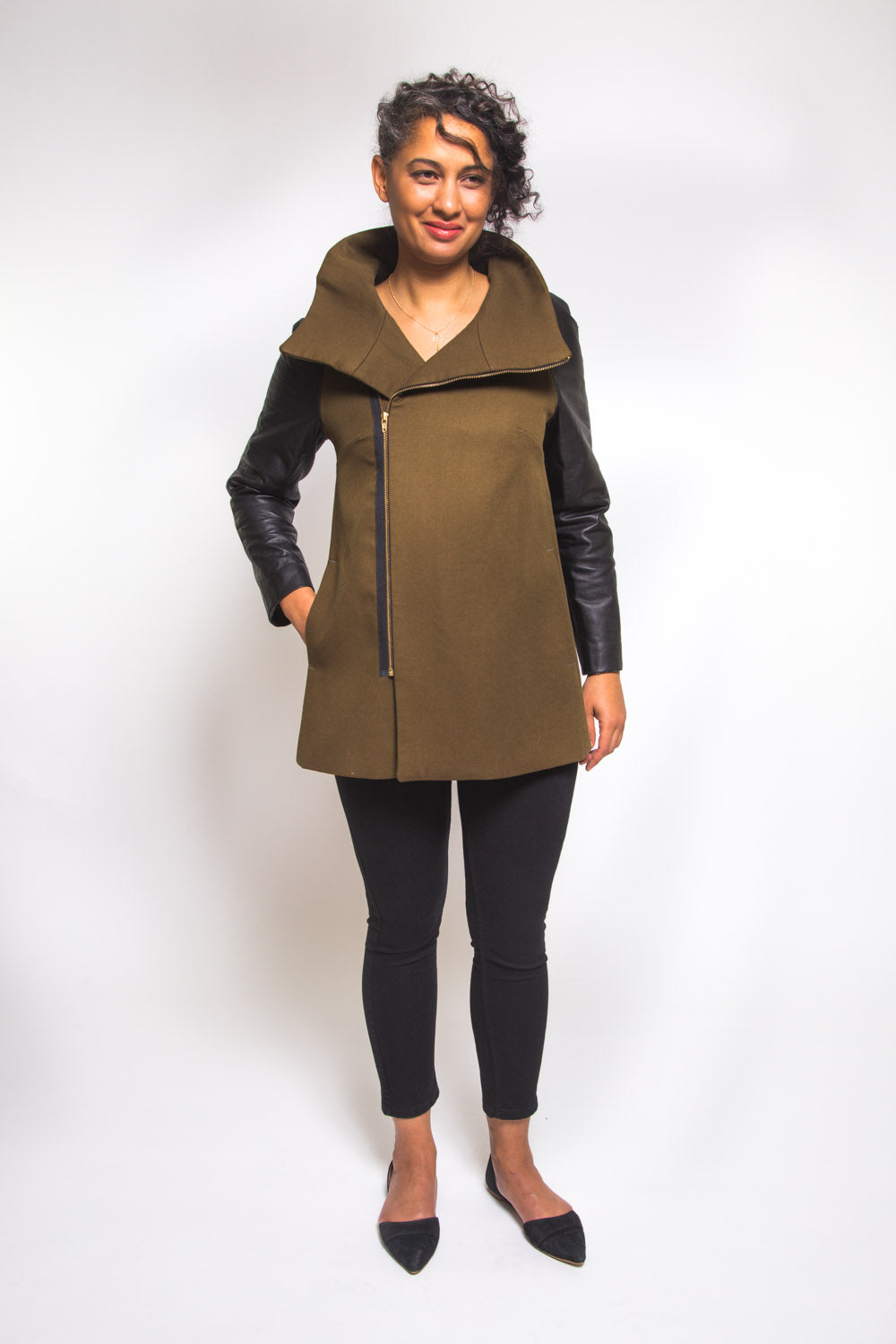 Model in an olive wool coat sewn from the Closet Core Clare Coat sewing pattern, front view