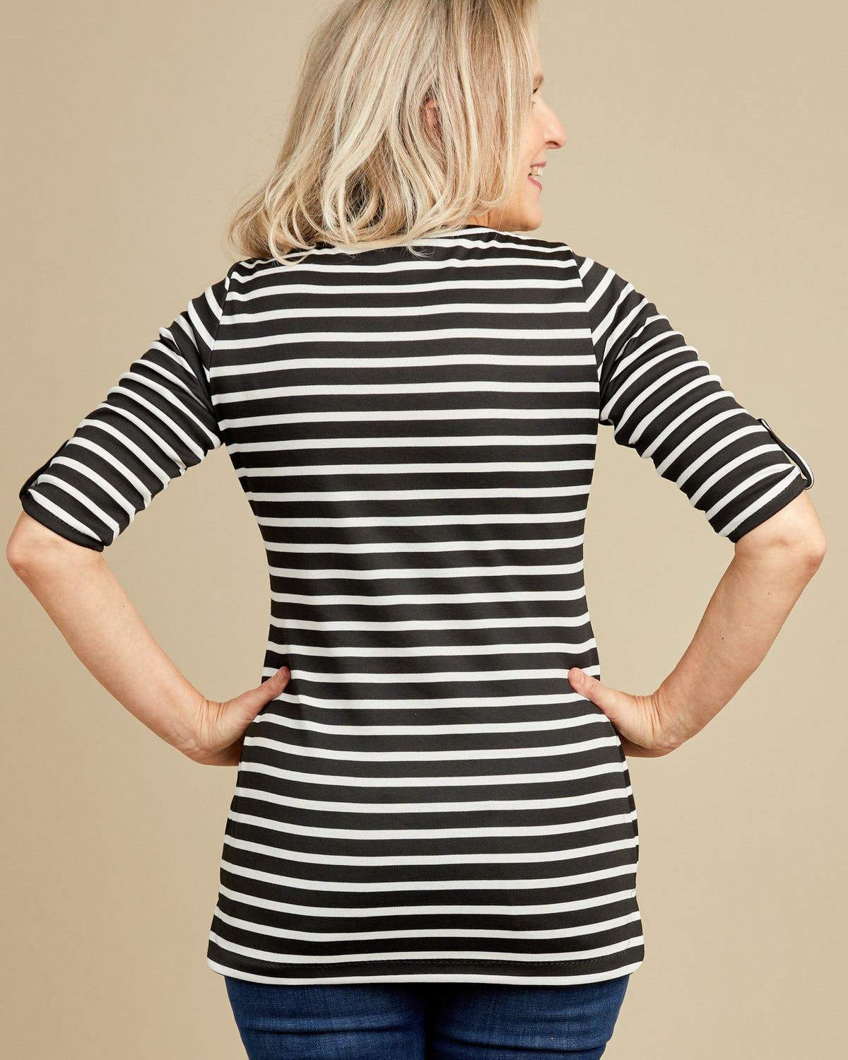 Cashmerette Concord T-Shirt PDF sewing pattern, woman wearing a black and white striped shirt