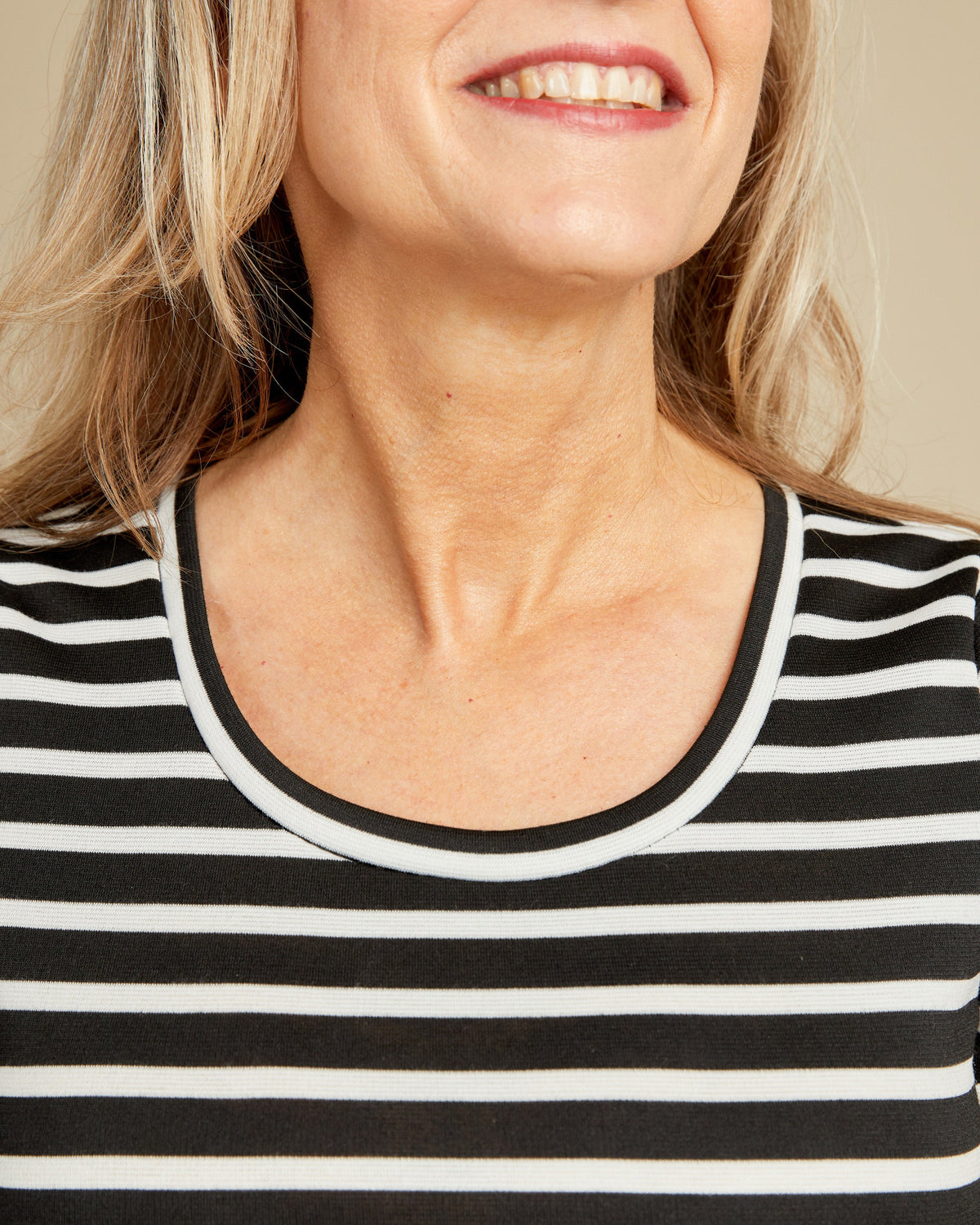 Cashmerette Concord T-Shirt PDF sewing pattern, close-up of a person wearing a black and white striped shirt