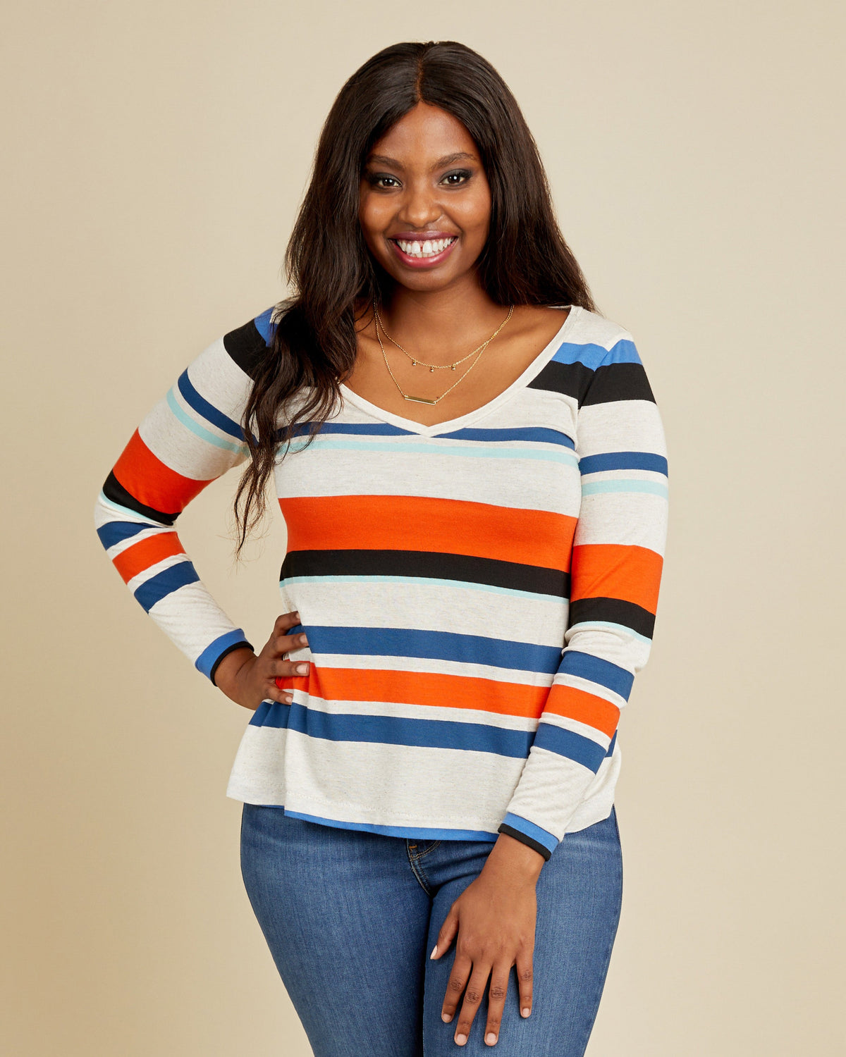 Cashmerette Concord T-Shirt PDF sewing pattern, woman wearing a colorful striped sweater